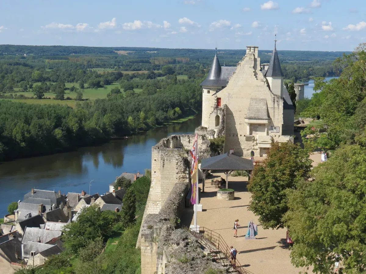 The royal fortress of Chinon above the town and the Vienne, a château on the wine side of Loire Valley wine and castle tours