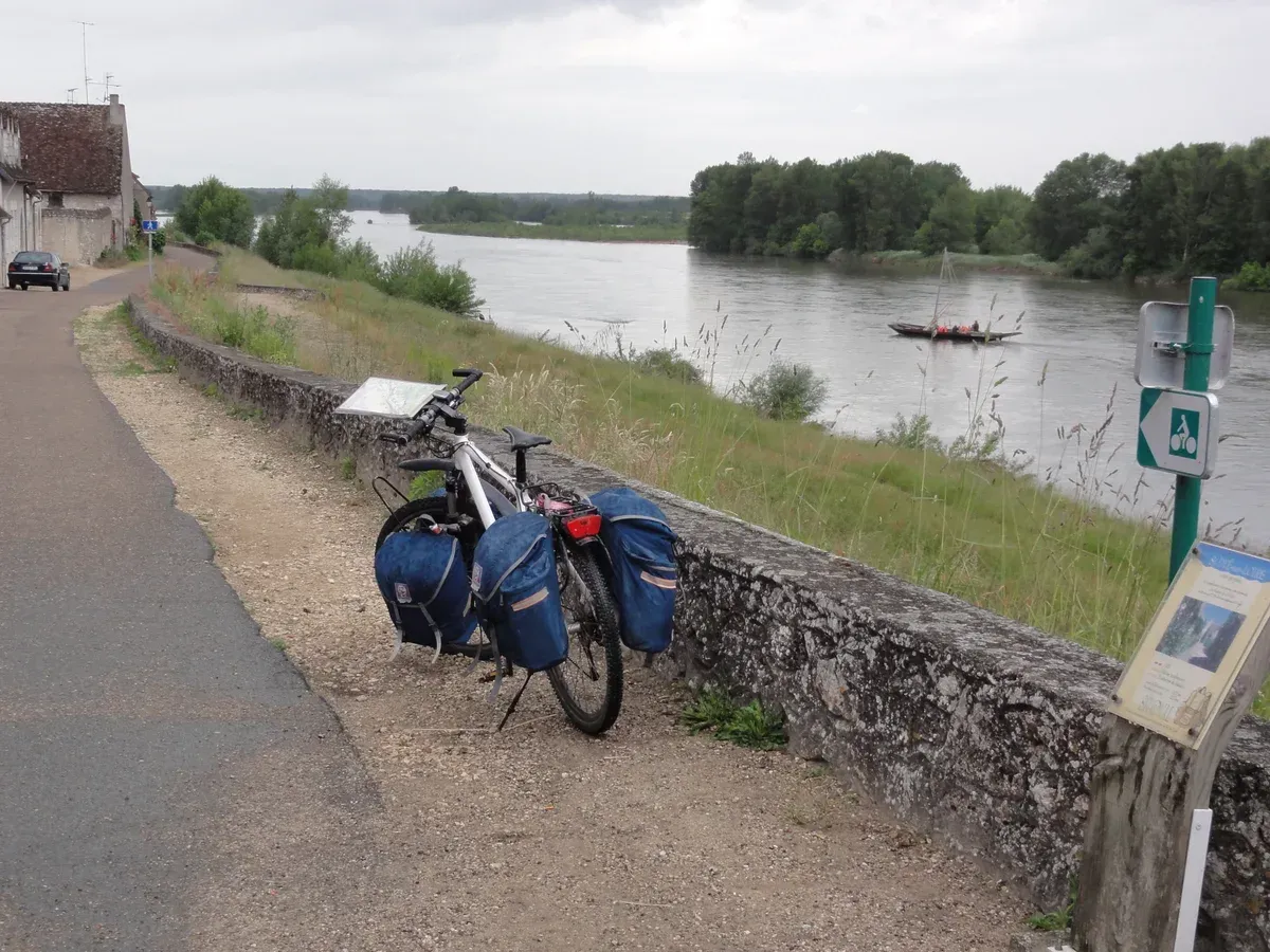 A touring bike parked on the Loire à Vélo route above the river, a car-free alternative to Loire Valley wine and castle tours
